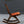 American Victorian Folding Cane Rocking Chair w/ Carved Rose Crest, c.1920's