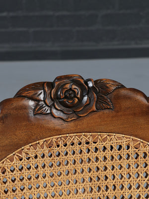 American Victorian Folding Cane Rocking Chair w/ Carved Rose Crest, c.1920's
