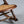 American Victorian Folding Cane Rocking Chair w/ Carved Rose Crest, c.1920's
