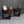 Pair of English Jacobean Revival Carved Oak Demilune Console Tables, c.1920’s