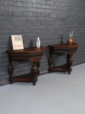 Pair of English Jacobean Revival Carved Oak Demilune Console Tables, c.1920’s