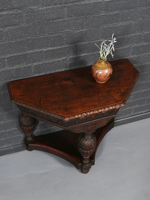 Pair of English Jacobean Revival Carved Oak Demilune Console Tables, c.1920’s