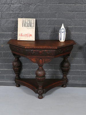 Pair of English Jacobean Revival Carved Oak Demilune Console Tables, c.1920’s
