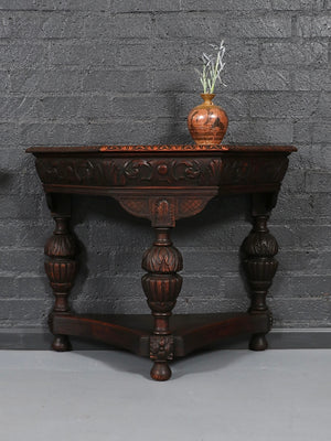 Pair of English Jacobean Revival Carved Oak Demilune Console Tables, c.1920’s