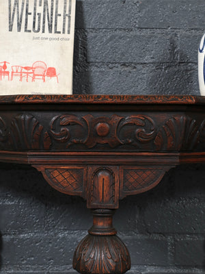 Pair of English Jacobean Revival Carved Oak Demilune Console Tables, c.1920’s