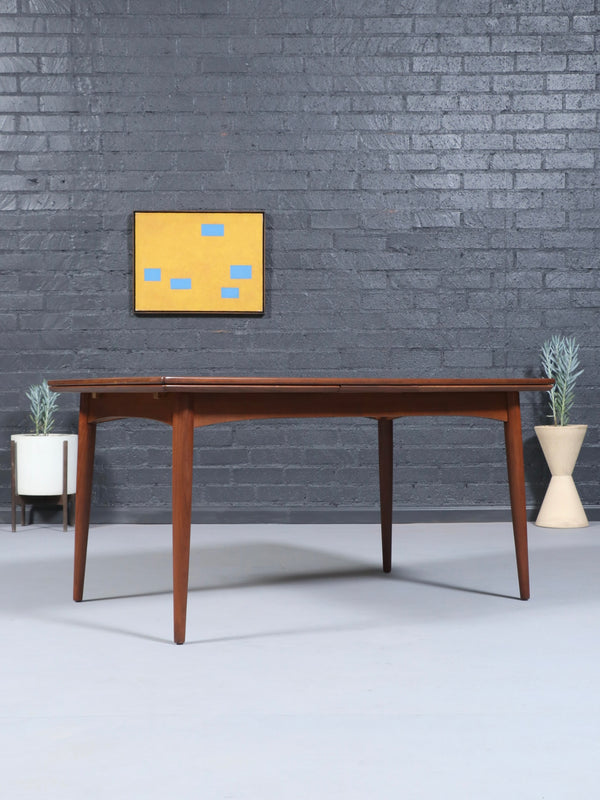 Expanding Mid-Century Danish Modern Walnut Draw-Leaf Dining Table, c.1950’s