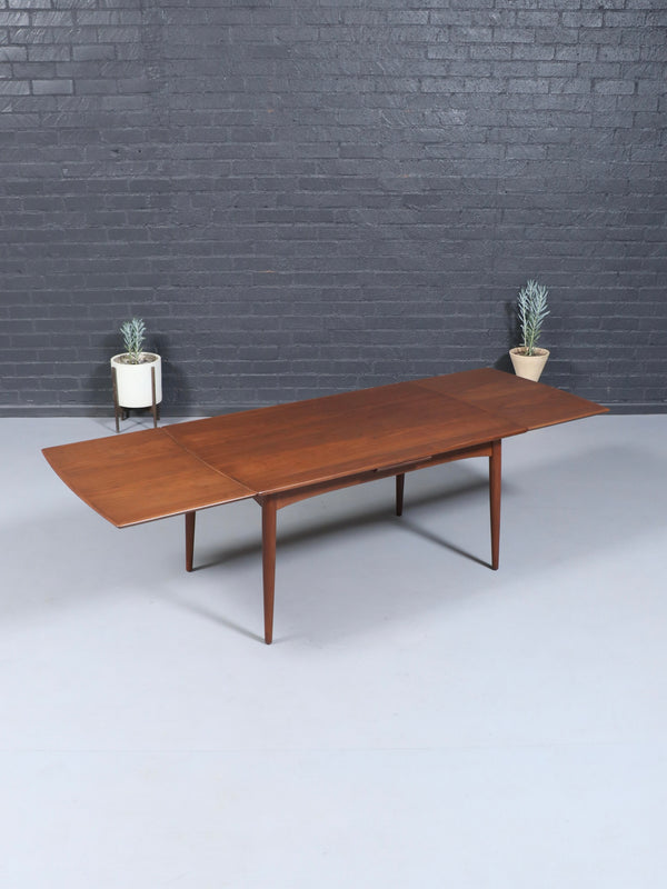 Expanding Mid-Century Danish Modern Walnut Draw-Leaf Dining Table, c.1950’s