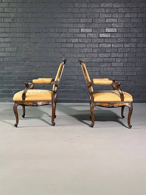 Pair of French Louis XV Carved Walnut Fauteuil Armchairs with Floral Needlepoint Upholstery, c.1920's