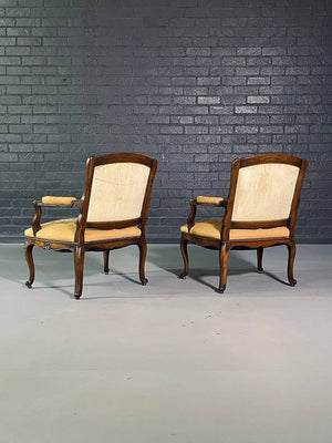 Pair of French Louis XV Carved Walnut Fauteuil Armchairs with Floral Needlepoint Upholstery, c.1920's