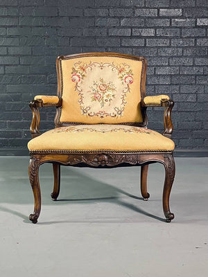 Pair of French Louis XV Carved Walnut Fauteuil Armchairs with Floral Needlepoint Upholstery, c.1920's