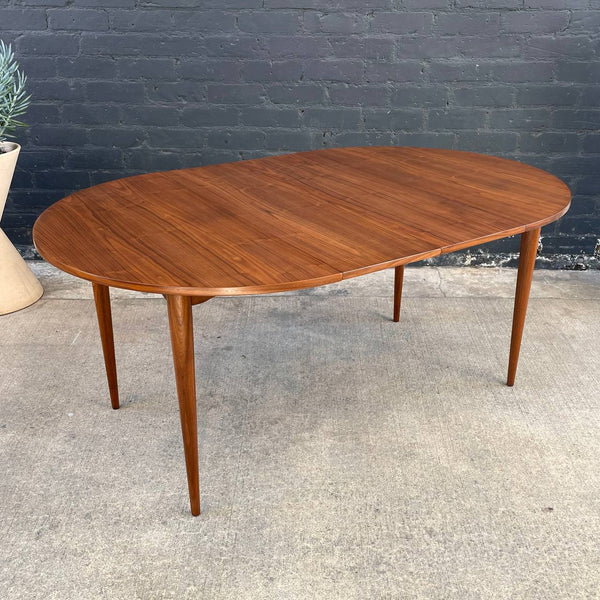 Expanding Mid-Century Modern Round Walnut Dining Table, c.1950’s