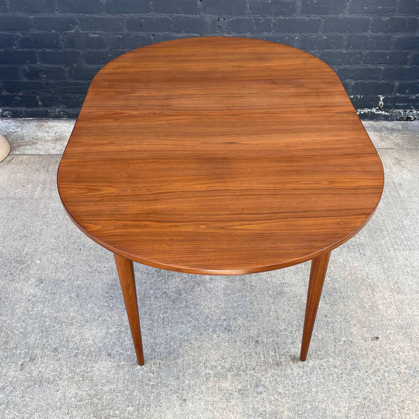 Expanding Mid-Century Modern Round Walnut Dining Table, c.1950’s