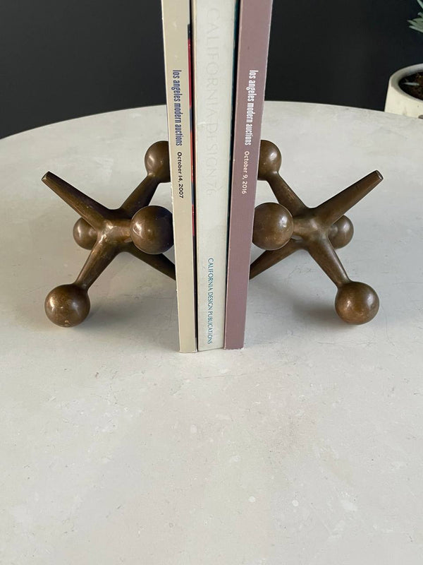 Pair of Mid-Century Patinated Brass Jax Bookends