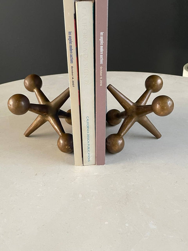 Pair of Mid-Century Patinated Brass Jax Bookends