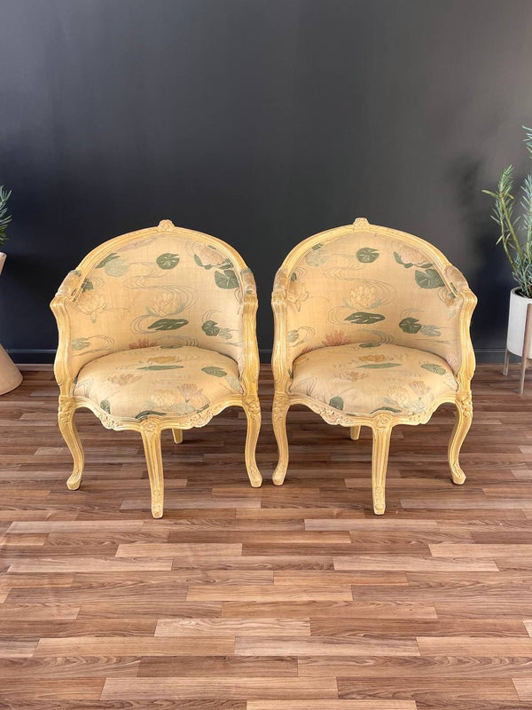 Pair of French Louis XVI Style Carved Chairs with an Antiqued Paint Finish