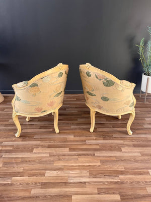 Pair of French Louis XVI Style Carved Chairs with an Antiqued Paint Finish