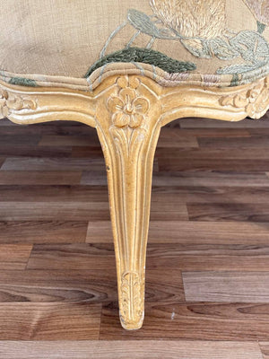 Pair of French Louis XVI Style Carved Chairs with an Antiqued Paint Finish