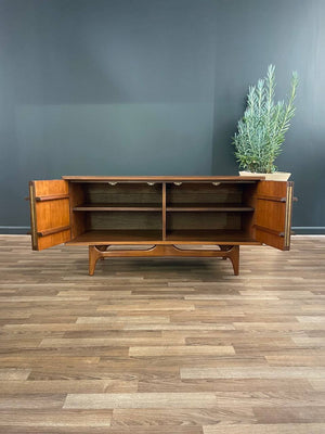 Mid-Century Modern Curved-Front Credenza with Bi-Folding Doors by United Furniture, c.1950’s