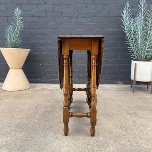 Vintage Drop-Leaf Oval Dining Table