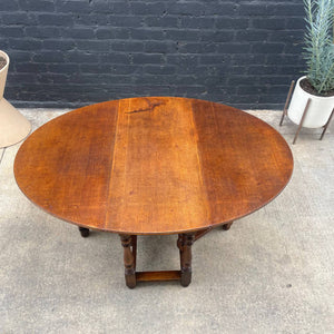 Antique American Style Oak Drop-Leaf Oval Dining Table