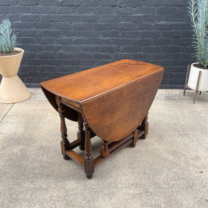 Antique American Style Oak Drop-Leaf Oval Dining Table