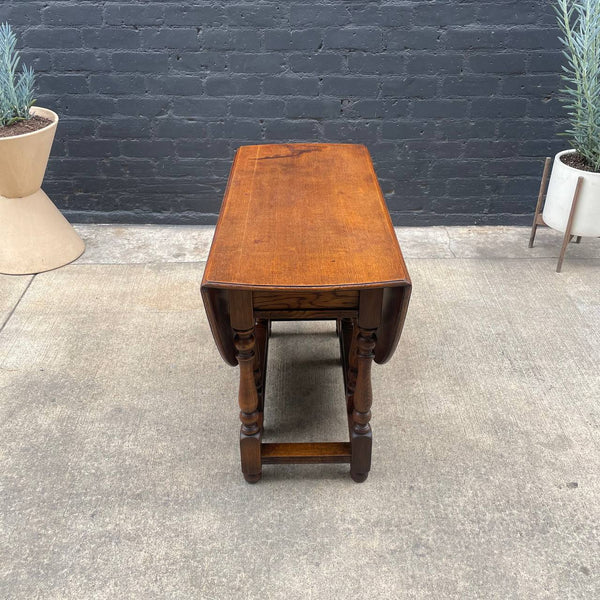 Antique American Style Oak Drop-Leaf Oval Dining Table