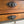 Load image into Gallery viewer, Vintage Farmhouse Bakers End Table with Possum Belly, c.1950’s

